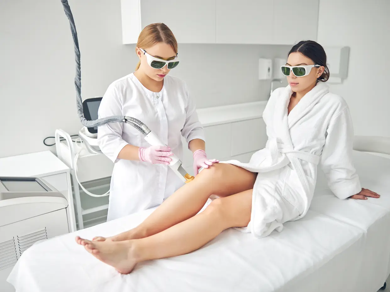 laser hair removal treatment on legs in spa